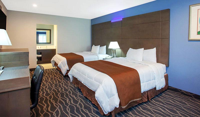 Double Queen Size Beds at Travelodge Anaheim Inn & Suites California Double Queen Size Beds at Travelodge Anaheim Inn & Suites California